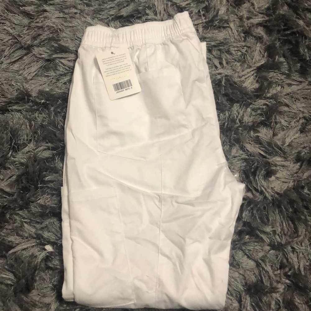 Brand new never worn white jannuu scrubs